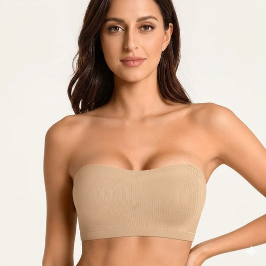 Nude wireless bandeau bra shown against a warm ivory background