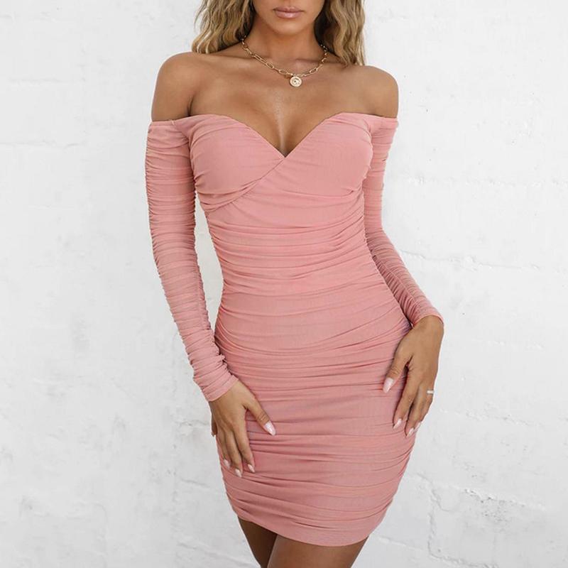 Woman Pink off-shoulder dress worn by a model against a white background