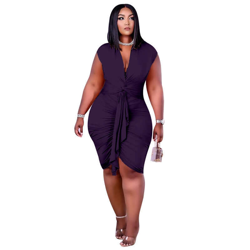 Woman wearing a purple dress on a white background