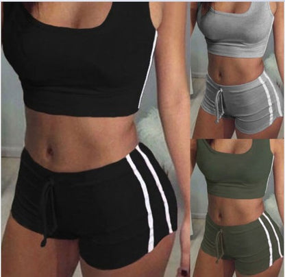 Women's Three different colored athletic outfits with shorts and sports bras.