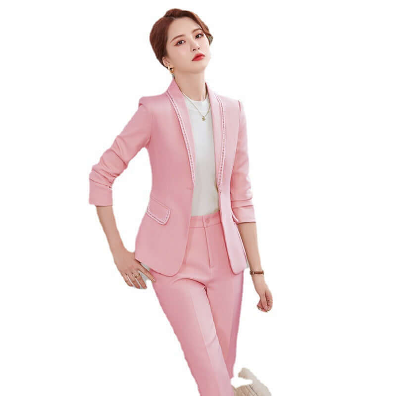 Woman wearing a pink suit on a white background