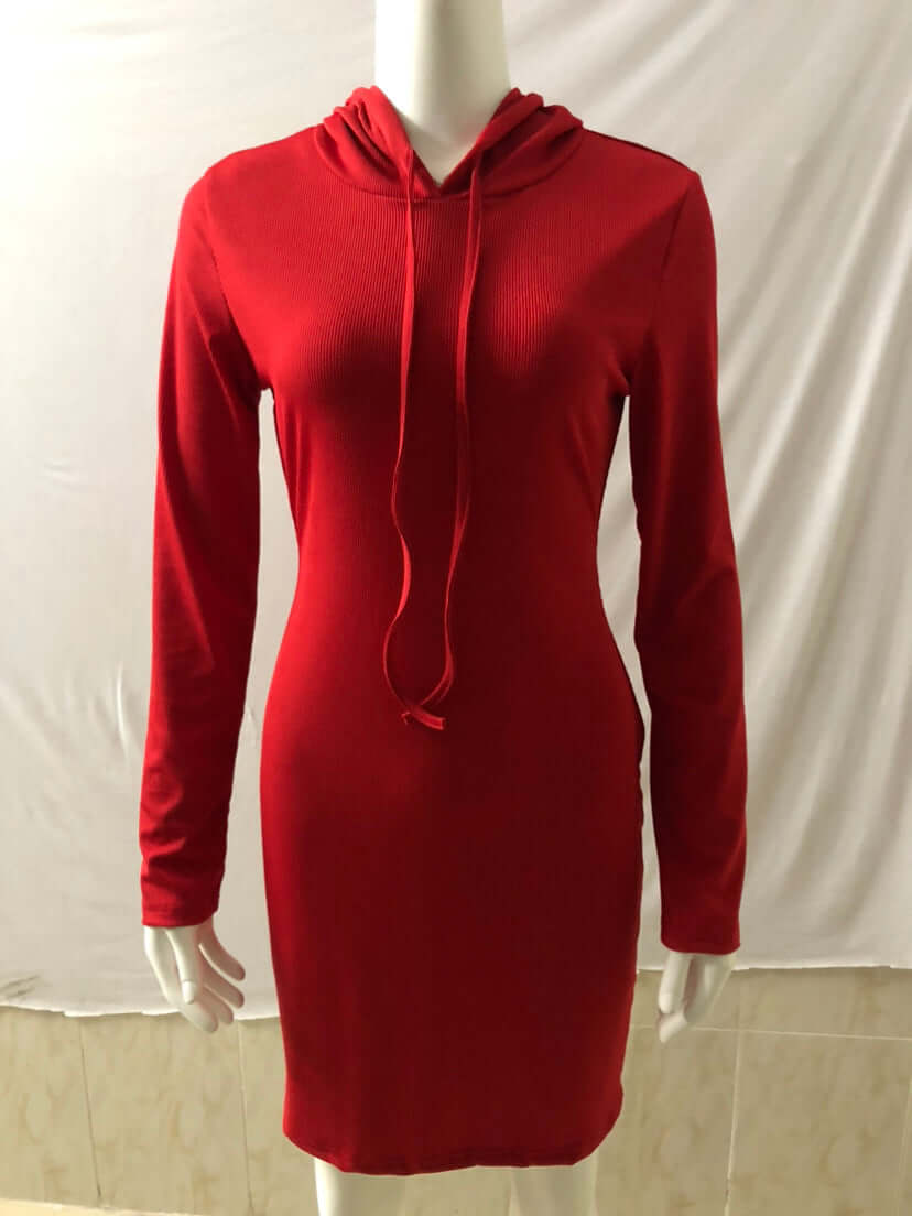 A red long-sleeve hooded dress displayed on a white mannequin against a white fabric backdrop.